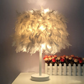 FeatherGlow Tischlampe mit Feder-Design