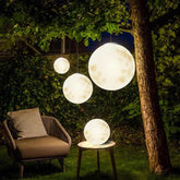 Solar garden light in moonlight design