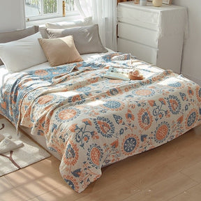 Lichte mousseline bedsprei met bloemmotief